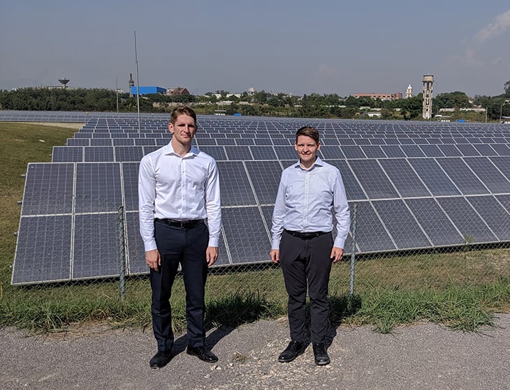 two men on a Solar-power-plant